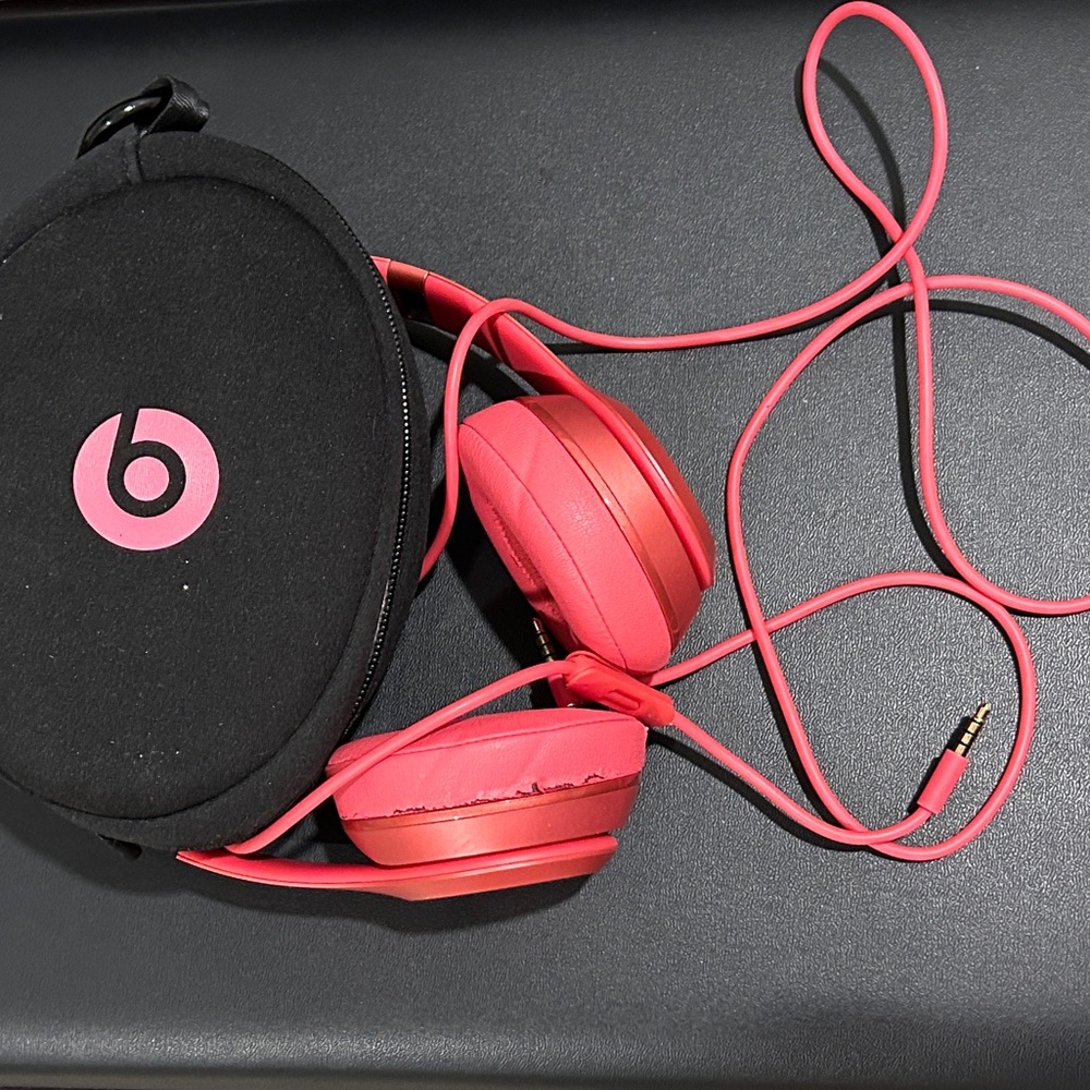 Solo Beats by Dre. Wired pink headphones